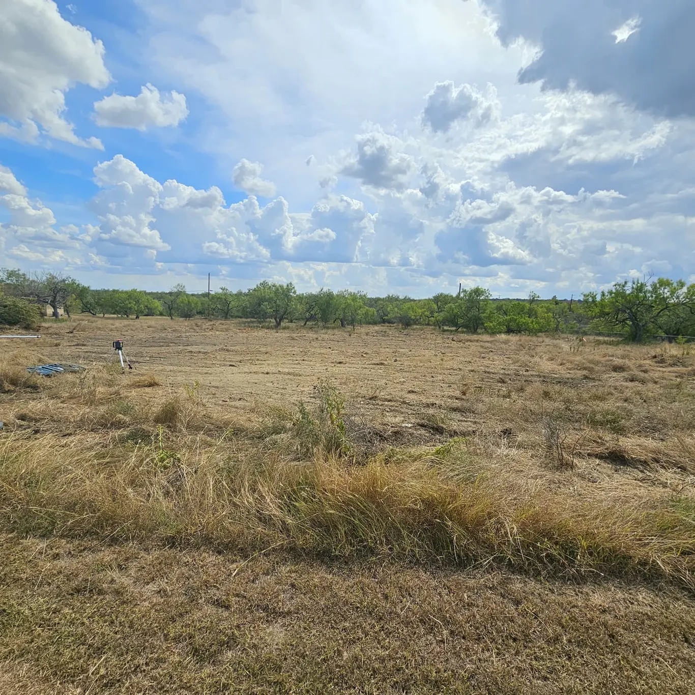 Big Texas sky over a wide-open cleared homesite