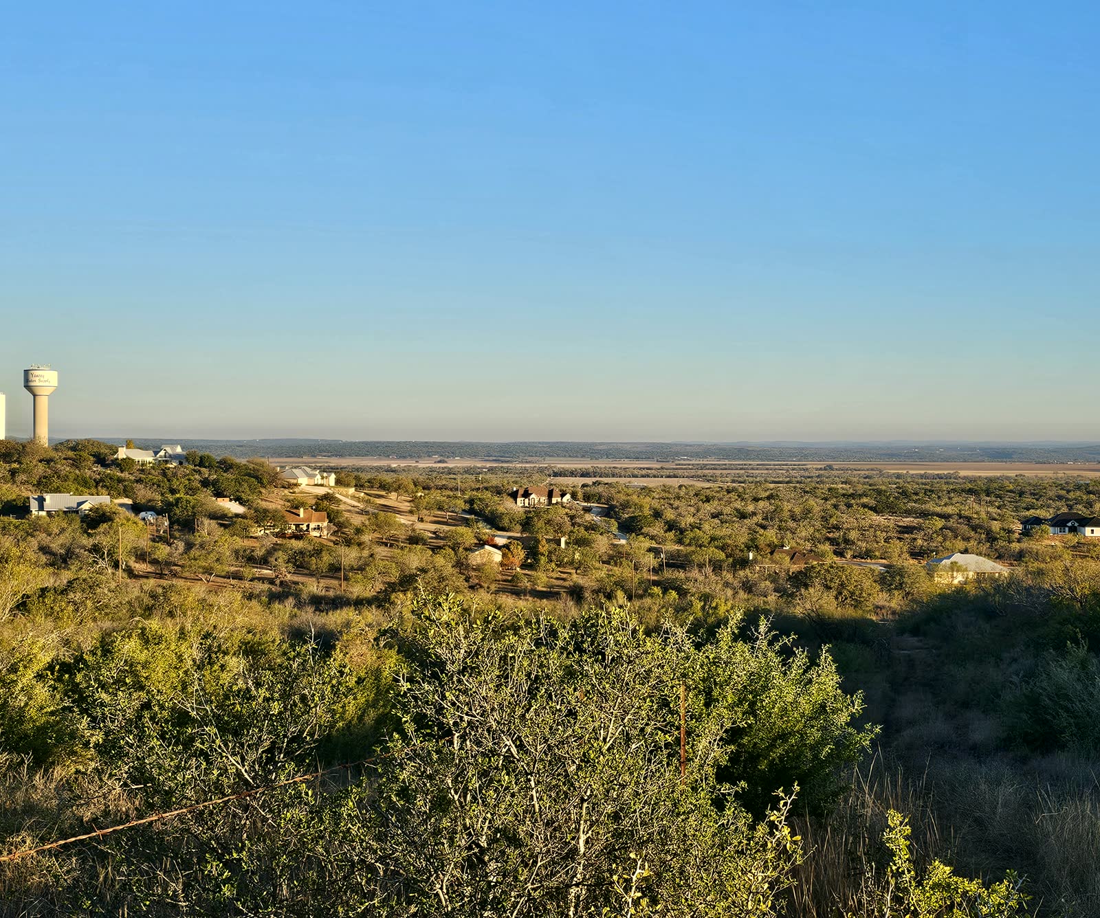 Custom ranch home nestled in the oaks near Medina Valley Ranch