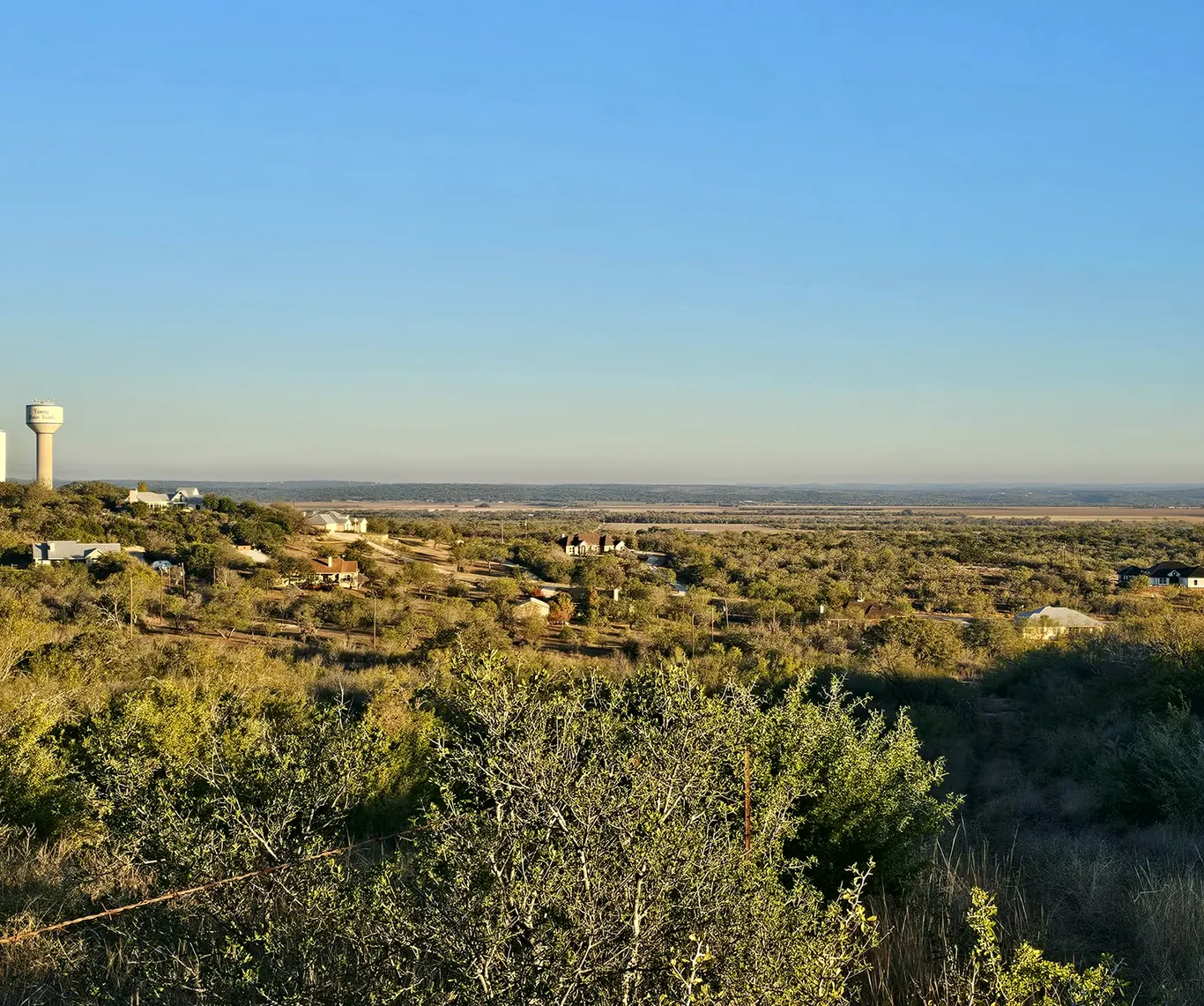 Custom ranch home nestled in the oaks near Medina Valley Ranch